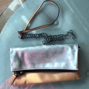 Loft reversible leather/silver clutch bag